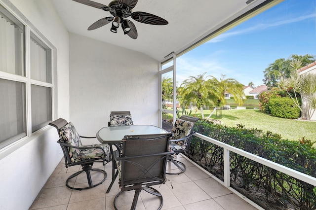 exterior space featuring lofted ceiling and ceiling fan