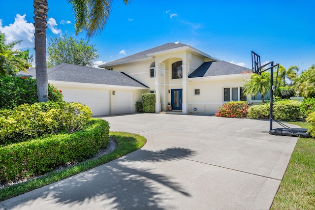 view of front of home with a garage