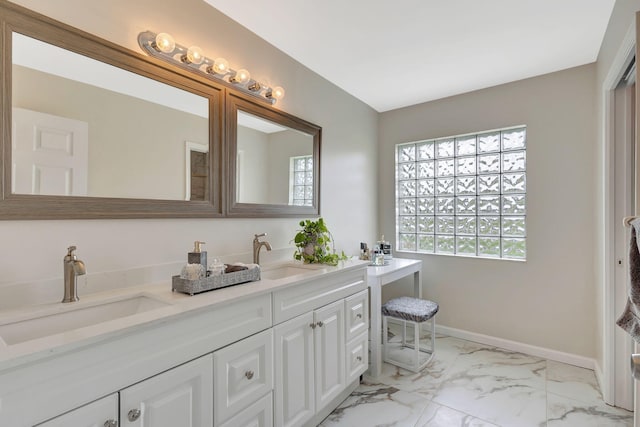 bathroom with tile patterned flooring and vanity