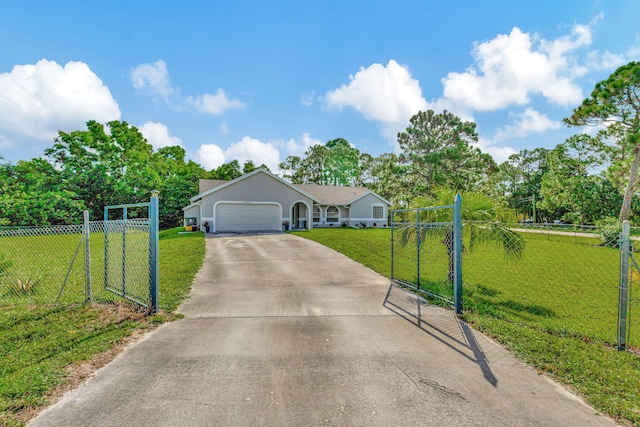 ranch-style house featuring a garage and a front lawn