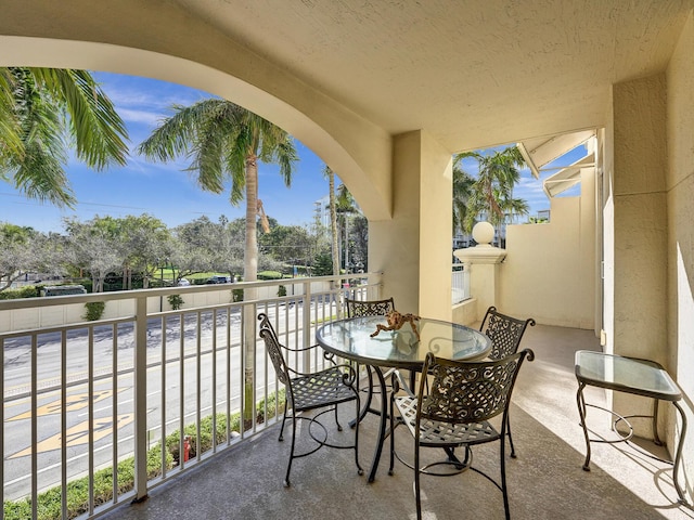 view of patio with a balcony