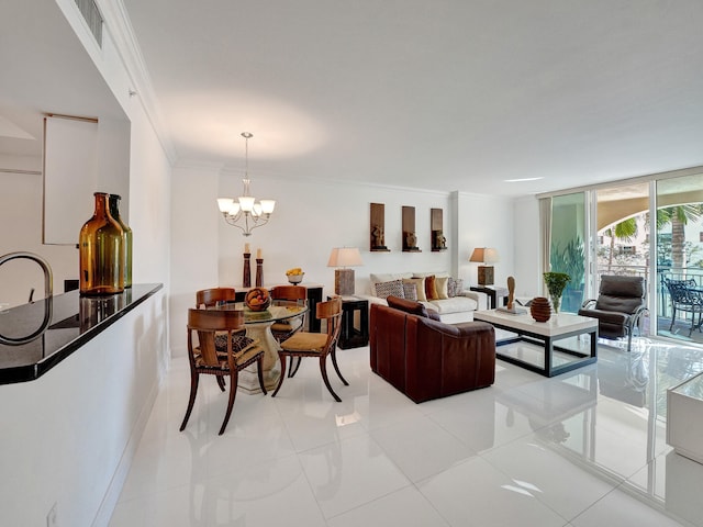 living room with light tile patterned floors, crown molding, and an inviting chandelier