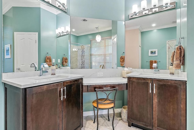 bathroom featuring tile patterned flooring, ornamental molding, and vanity