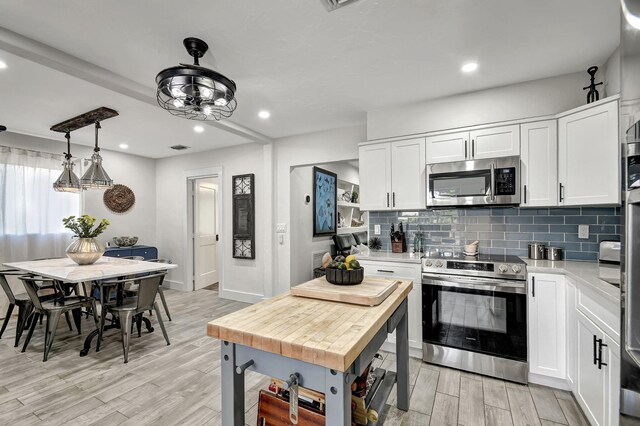 dining area with light hardwood / wood-style flooring