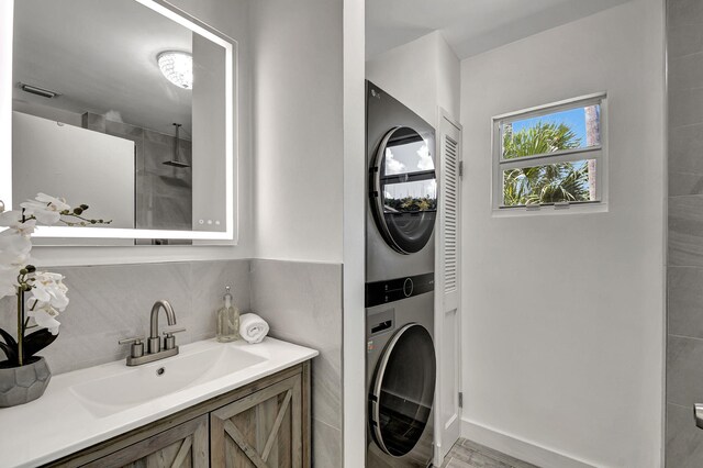 bathroom featuring tile walls, a shower with shower door, and toilet