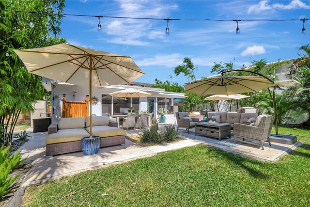 view of patio / terrace with a hot tub