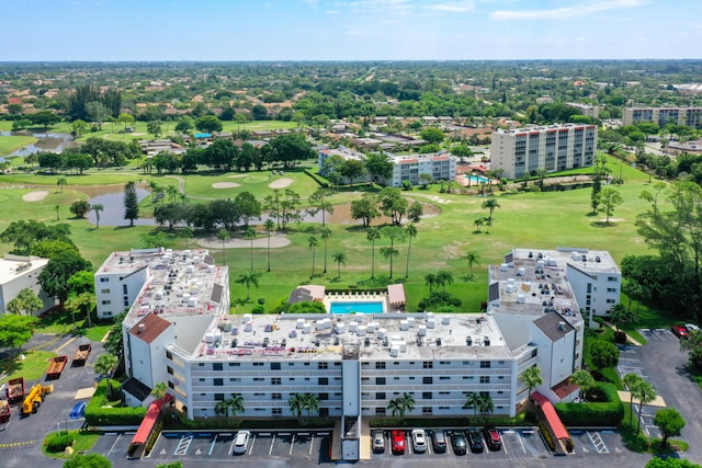 birds eye view of property featuring a water view and golf course view