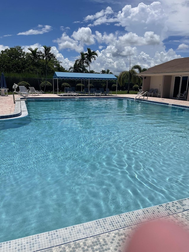 pool featuring a patio area