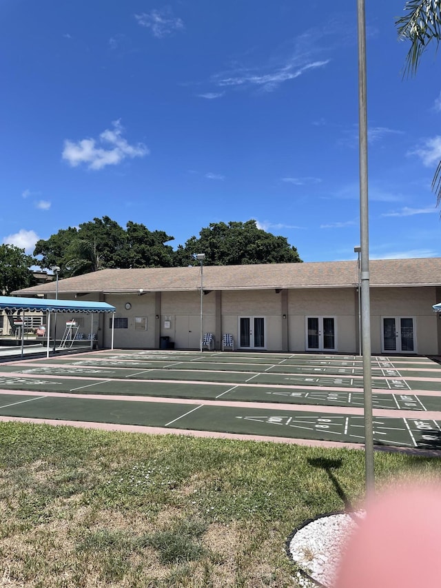 view of community featuring shuffleboard