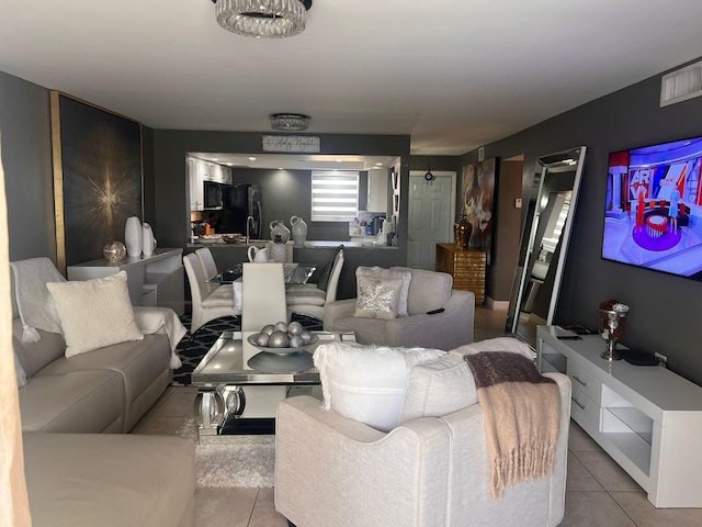 living room featuring light tile patterned floors