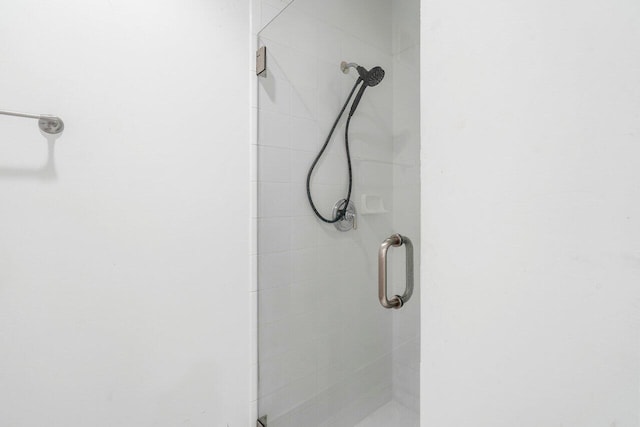 bathroom with an enclosed shower