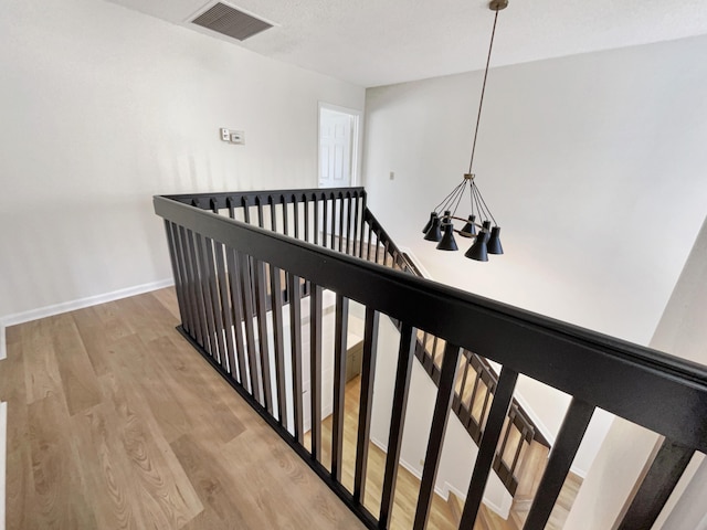 hallway featuring light wood-type flooring