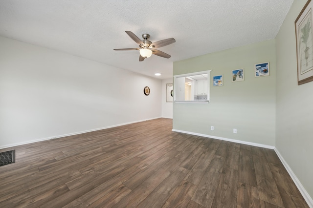 spare room featuring ceiling fan, a textured ceiling, and hardwood / wood-style floors