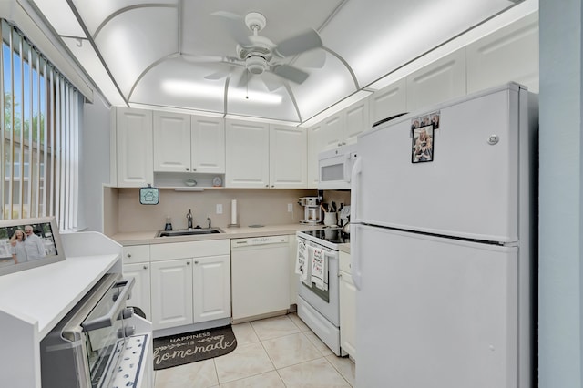 kitchen featuring ceiling fan, white appliances, light tile patterned flooring, and white cabinets