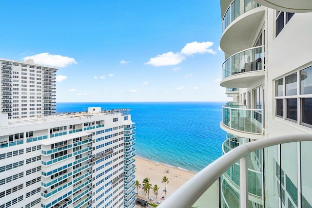 property view of water featuring a beach view