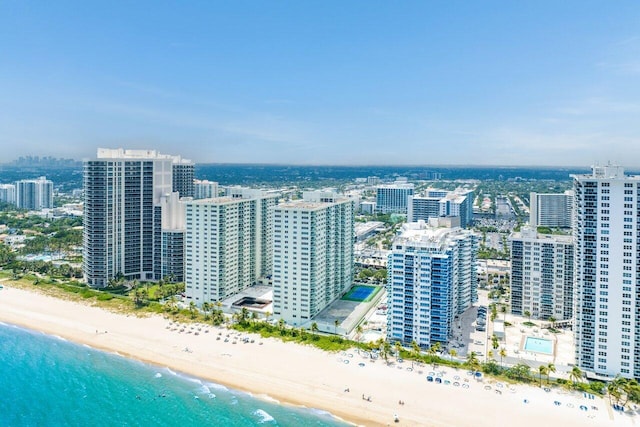 bird's eye view featuring a beach view and a water view