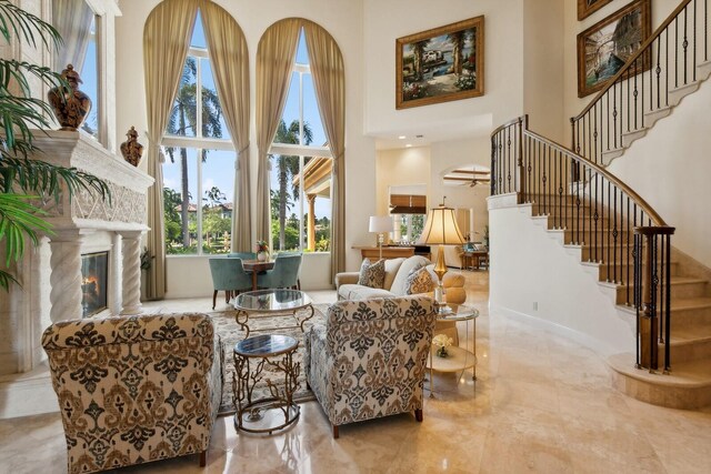 dining space with light tile patterned floors, plenty of natural light, and crown molding