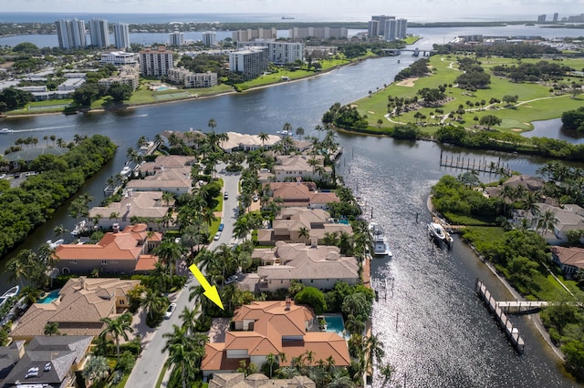 birds eye view of property featuring a water view