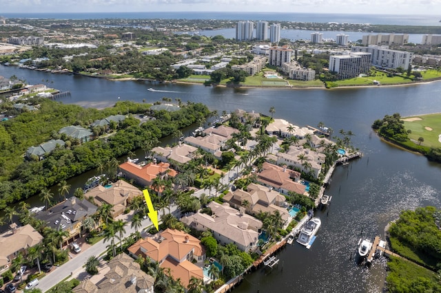 drone / aerial view with a water view