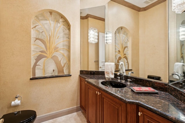 bathroom featuring crown molding, vanity, toilet, and tile patterned flooring