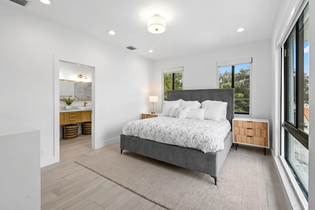 bedroom featuring hardwood / wood-style flooring