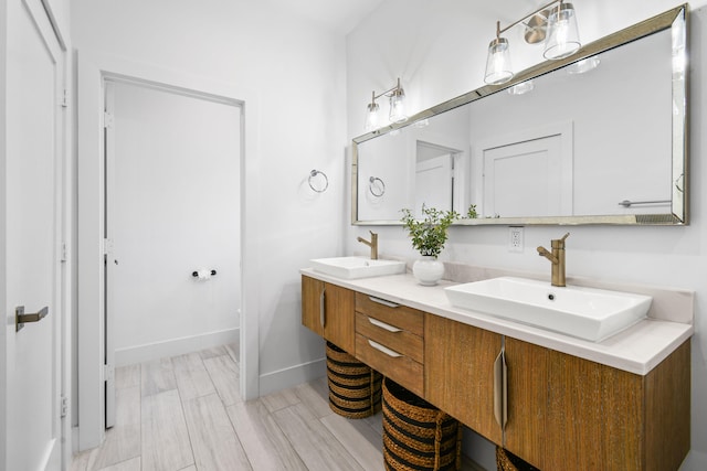 bathroom featuring hardwood / wood-style floors and vanity