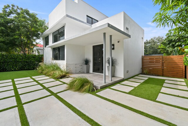 back of house featuring a patio area