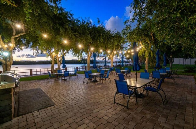 view of patio featuring a water view