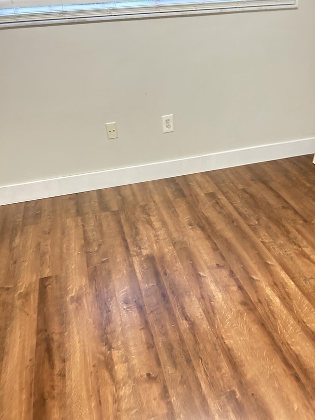 details with hardwood / wood-style flooring