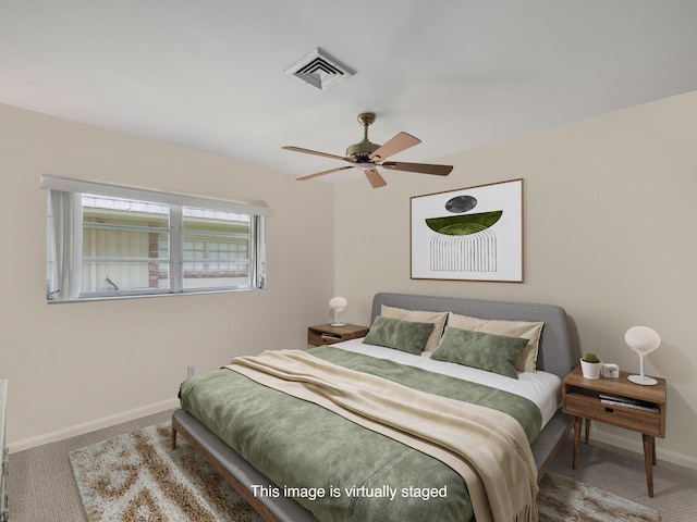 carpeted bedroom featuring ceiling fan