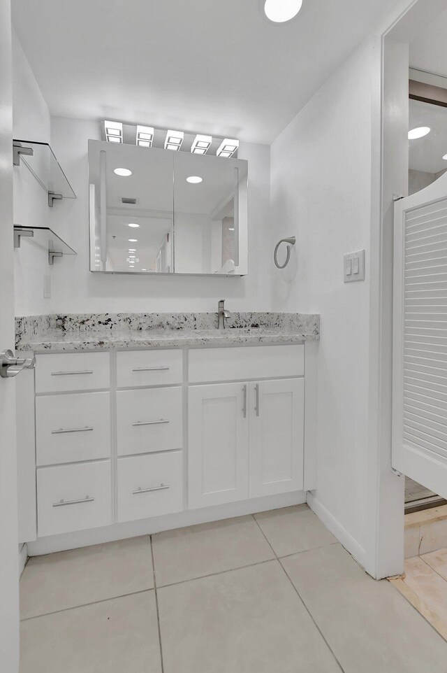 bathroom featuring vanity and tile patterned floors