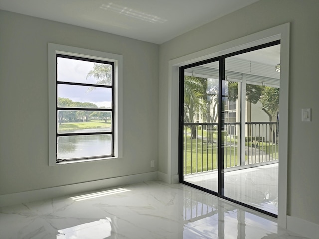 spare room with plenty of natural light