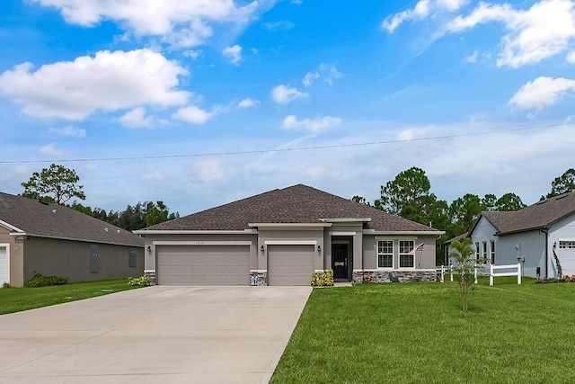 view of front facade with a front lawn and a garage