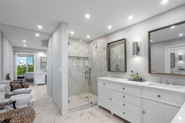 bathroom with tile patterned floors, an enclosed shower, double vanity, and toilet