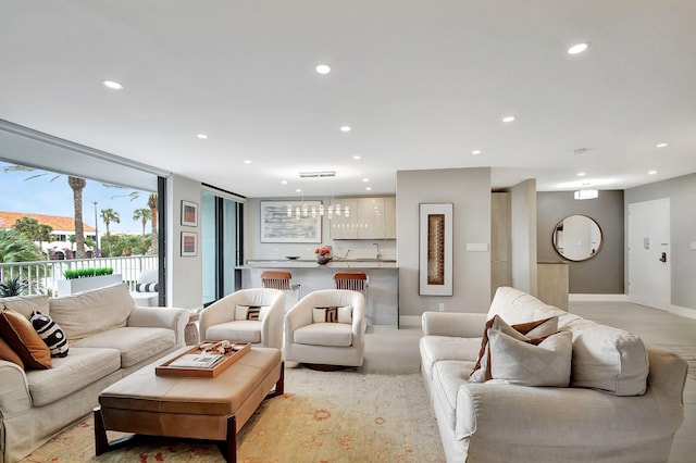 carpeted living room featuring sink