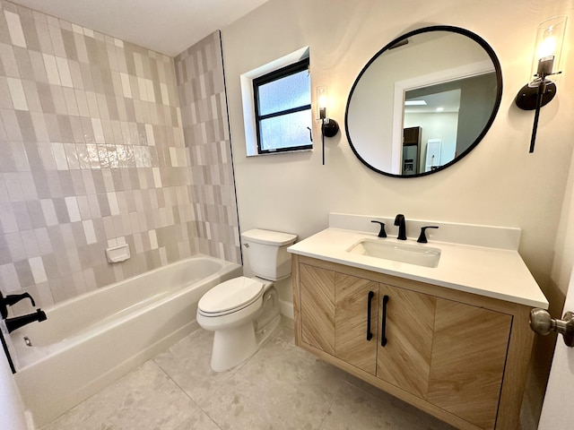 full bathroom featuring tile patterned flooring, toilet, tub / shower combination, and vanity