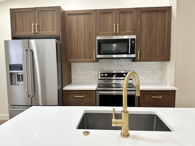 room details featuring stainless steel counters and stainless steel range