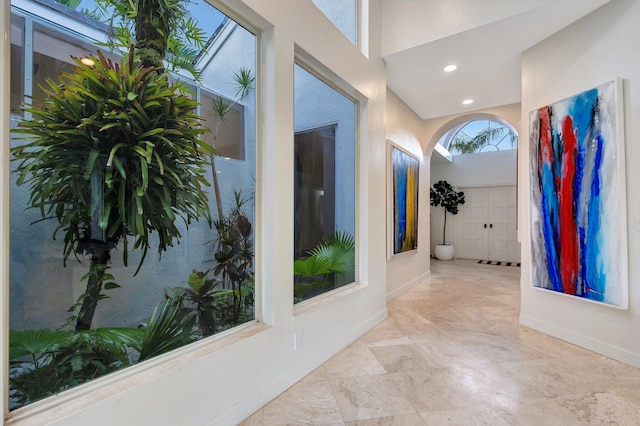 entrance foyer with light tile patterned floors