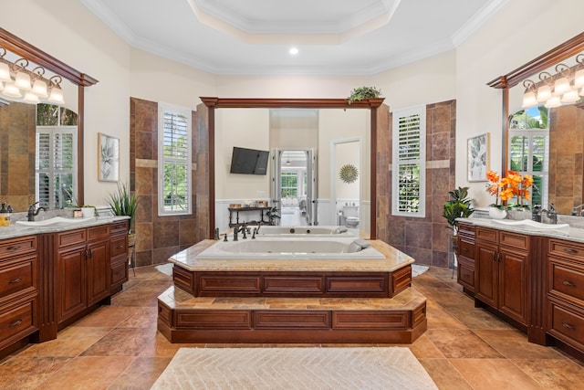 bathroom with a wealth of natural light and dual bowl vanity