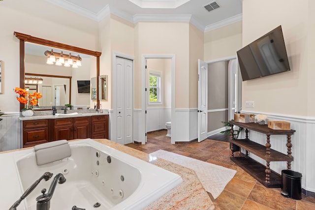 bathroom with tile patterned flooring, vanity, and ornamental molding