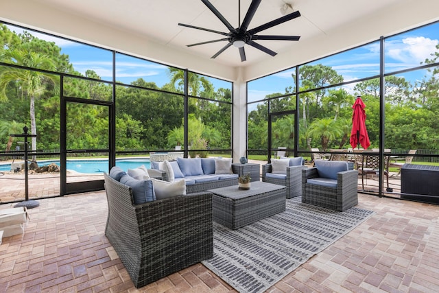 sunroom / solarium with ceiling fan and plenty of natural light