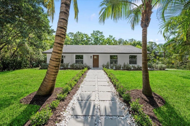 view of front facade with a front yard