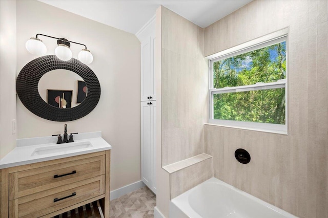 bathroom with tile patterned floors, shower / bathing tub combination, and vanity