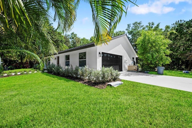 view of property exterior featuring a garage and a yard