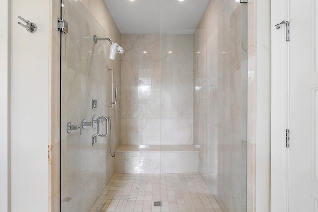 bathroom with a stall shower