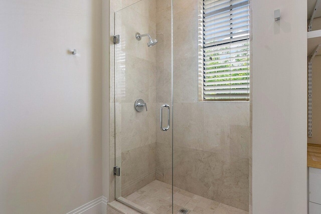 bathroom featuring a stall shower