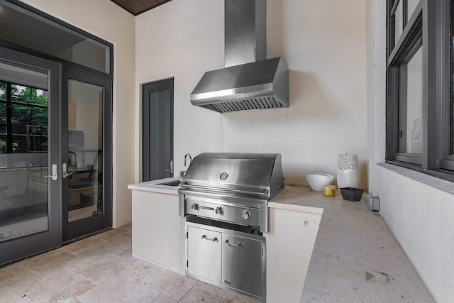 view of patio with a sink, a grill, french doors, and area for grilling