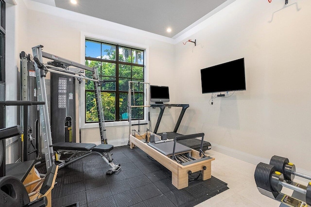 workout room featuring baseboards and recessed lighting