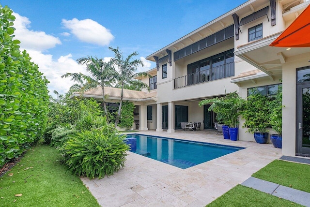 outdoor pool with a patio