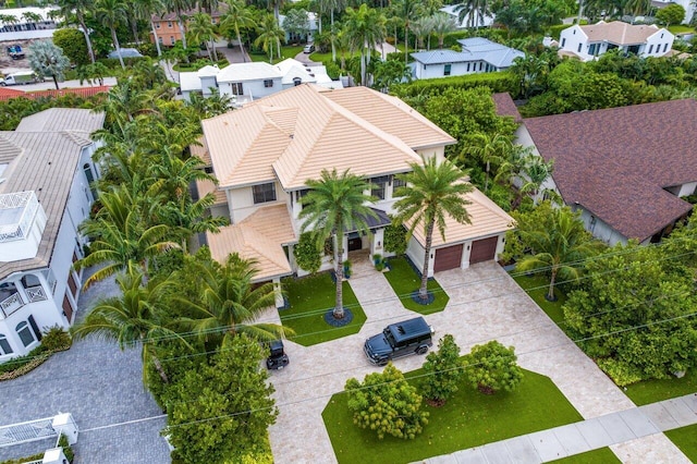 birds eye view of property with a residential view